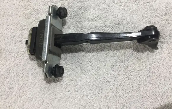 Rear door check strap stopper