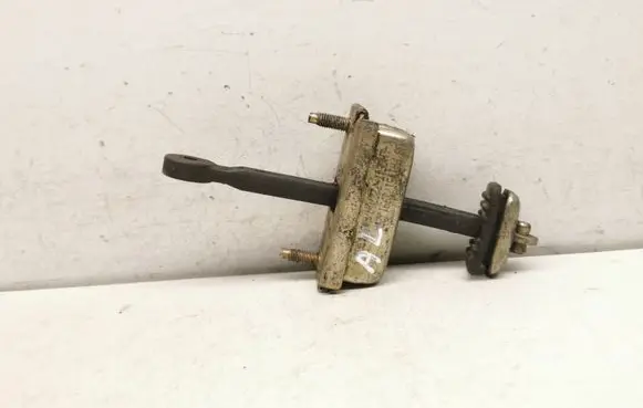 Mazda 626 Rear door check strap stopper