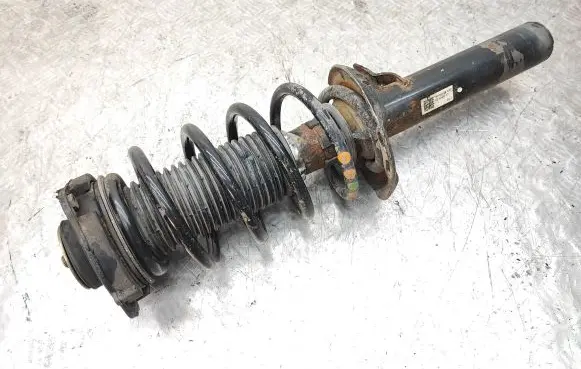 Volkswagen PASSAT B7 Front shock absorber with coil spring 3C0413031AT 166VWAMBB