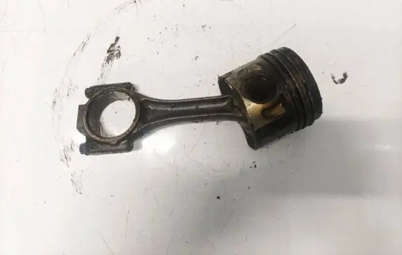 Piston with connecting rod