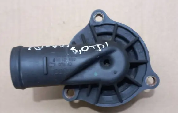 Thermostat/thermostat housing