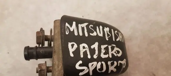 Mitsubishi Pajero Sport I Headlight washer spray nozzle