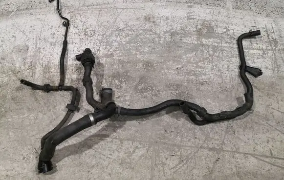 Volkswagen PASSAT B7 Engine coolant pipe/hose 1K0133687B 3AA122101G