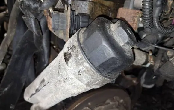 Opel Corsa D Oil filter cover 90530262 90530259