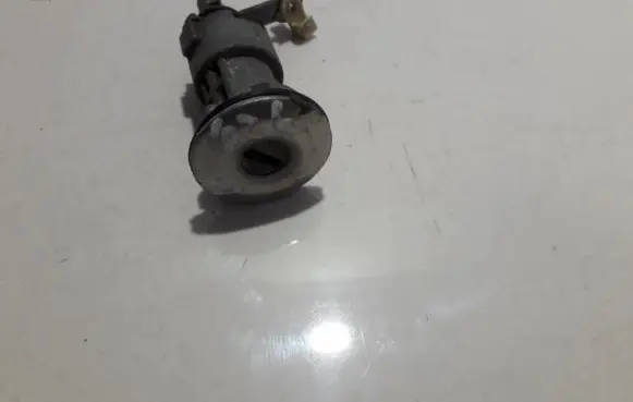 Mazda 626 Front door lock (next to the handle) 