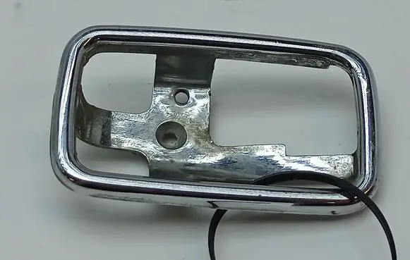 Mercedes-Benz 280 450 W116 Front door handle cover 1087660511