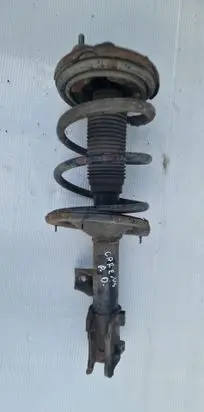 KIA Carens II Front shock absorber with coil spring