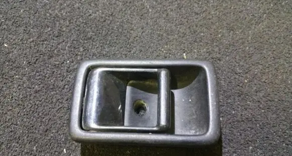 Mazda 323 Rear door interior handle