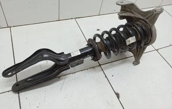 Tesla Model 3 Front shock absorber with coil spring 104436804B