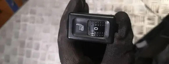 Seat heating switch