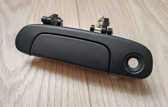 Mazda 323 F Front door exterior handle