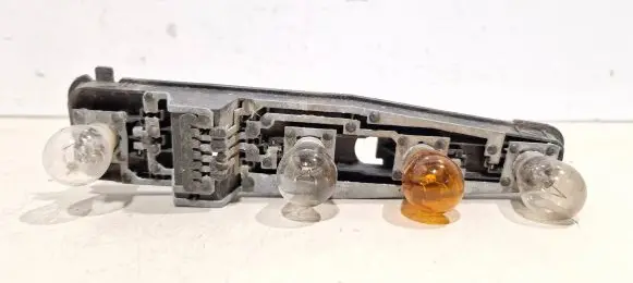 Opel Vectra B Tail light bulb cover holder 90585002