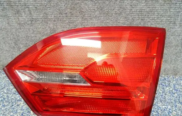 Volkswagen Jetta VI Tailgate rear/tail lights 5C6945094