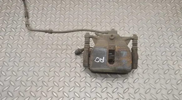 Volkswagen Golf VII Front brake caliper