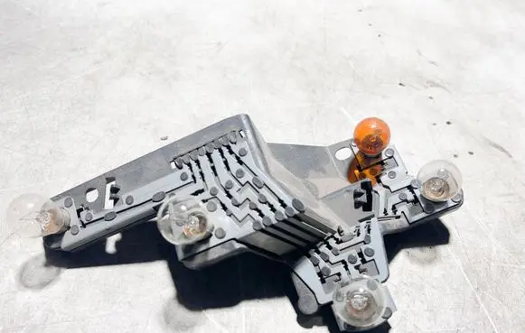 Jaguar X-Type Tail light bulb cover holder 89021757A