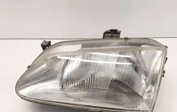 Renault Scenic I Headlight/headlamp 7701672734