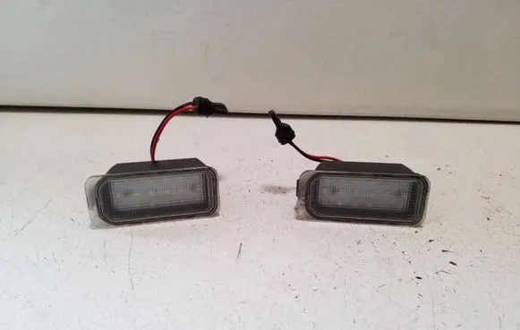 Jaguar XJ X351 Number plate light E44405