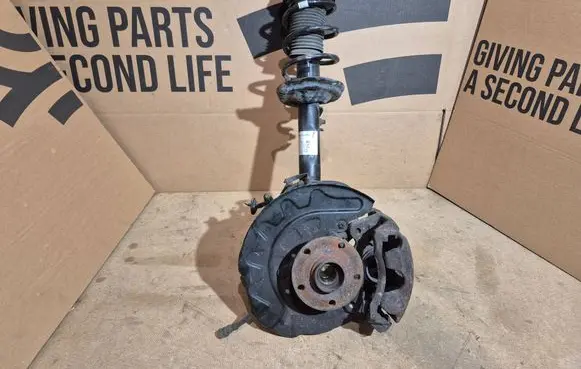 Volkswagen Golf VII Front wheel hub spindle knuckle