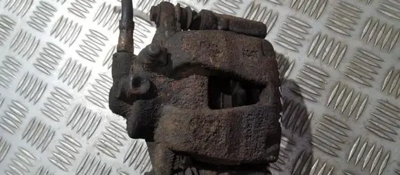 Opel Corsa D Front brake caliper 