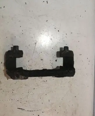 Volvo V70 Front Brake Caliper Pad/Carrier 