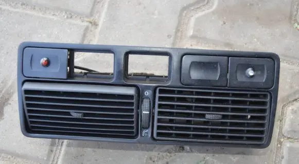 Volkswagen Golf IV Dash center air vent grill 1J0819736C