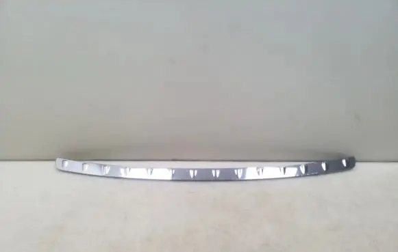 Rear bumper trim bar molding