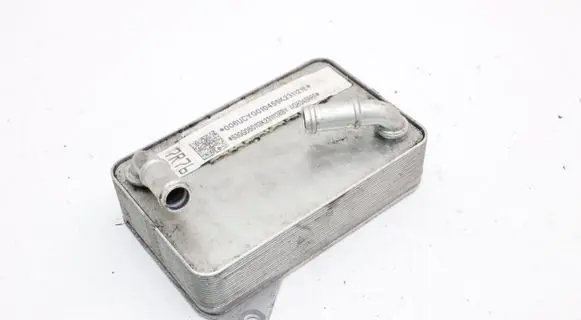 Audi Q3 F3 Engine oil radiator 0DD317019