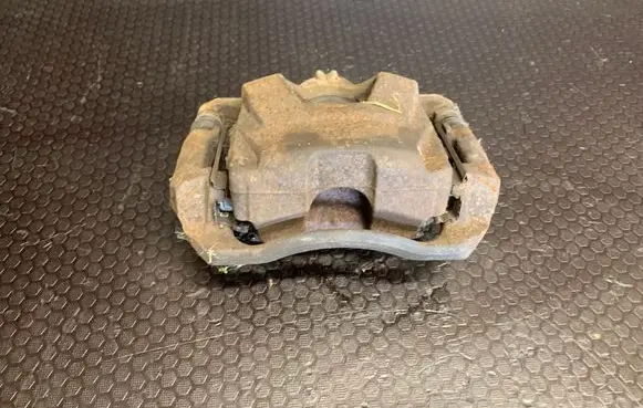 Opel Astra J Front brake caliper