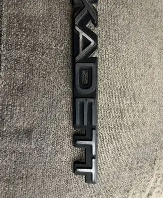 Opel Kadett D Manufacturers badge/model letters 90053231