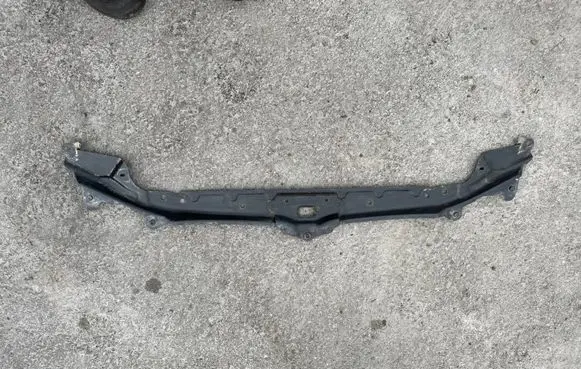 Top upper radiator support slam panel