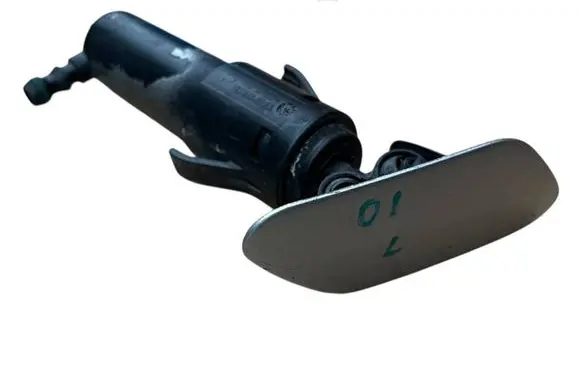 Headlight washer spray nozzle