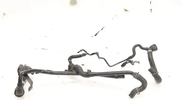 Volkswagen Touran III Engine coolant pipe/hose 5Q0121070AF