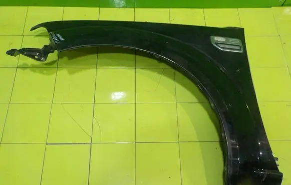 Nissan Navara D40 Fender PRZOD LEWY