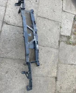 Top upper radiator support slam panel