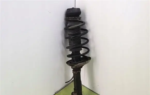 Volkswagen Golf IV Front shock absorber with coil spring 1J04130315