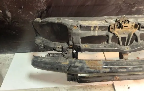 Volkswagen Golf IV Radiator support slam panel bracket 9103
