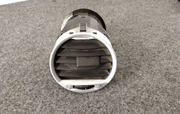 Volkswagen Caddy Dash center air vent grill 2K0819703B