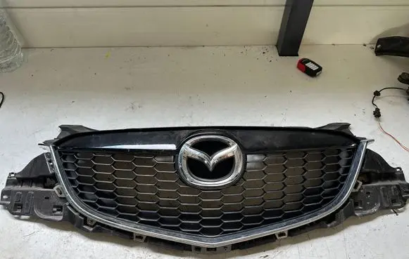 Mazda CX-5 Front bumper upper radiator grill KD4550712