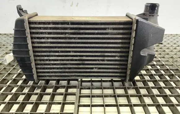 Opel Zafira B Intercooler radiator 13213402