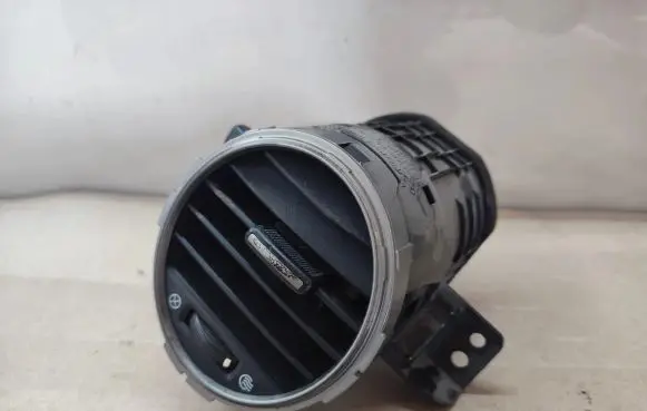KIA Carens II Dash center air vent grill 974201D000