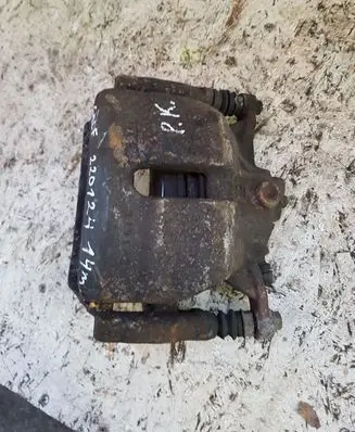 Volkswagen Golf VII Front brake caliper