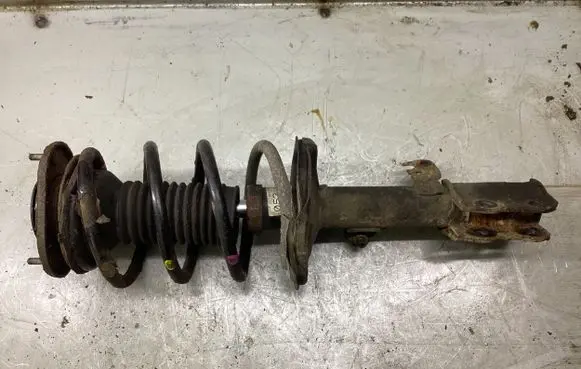 Toyota Corolla E120 E130 Front shock absorber with coil spring