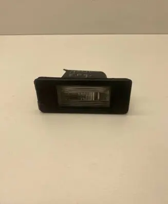 Chevrolet Malibu Number plate light 13590043