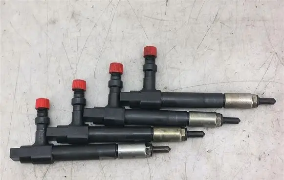 Mazda 323 Fuel injectors set D7390