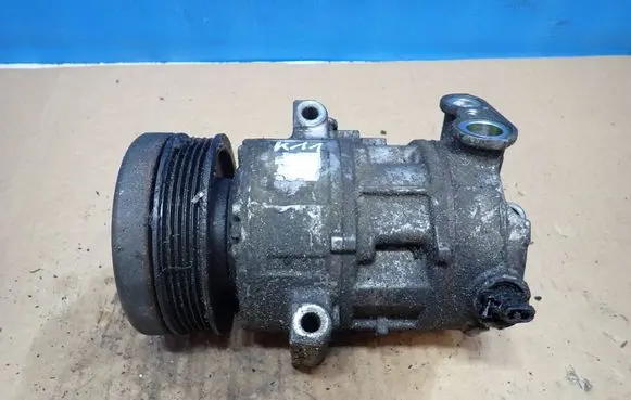 Opel Corsa D Air conditioning (A/C) compressor (pump) 55701200 6E6275200