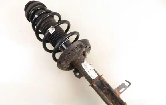 Opel Astra J Front shock absorber with coil spring 