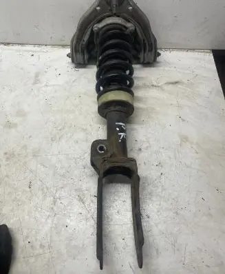 Front shock absorber with coil spring
