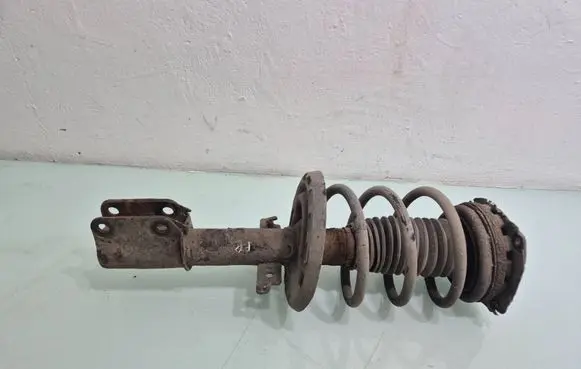 Renault Megane III Front shock absorber with coil spring 
