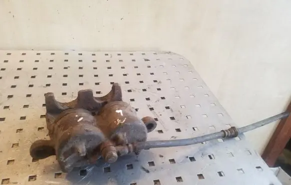 Mitsubishi Pajero Front brake caliper
