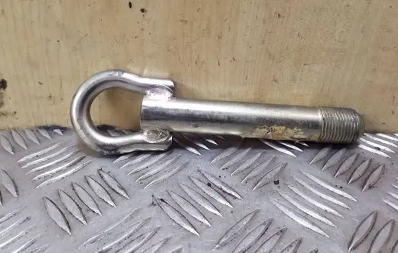 Towing hook eye